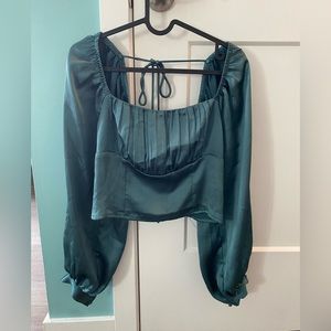 Silk emerald green Christmas dinner top dynamite